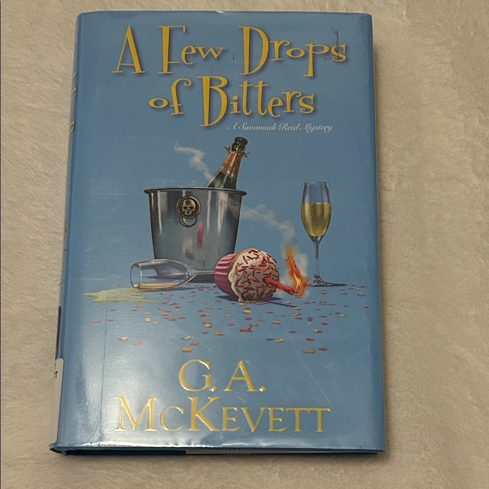 A Few Drops of Bitters Hardcover Book by G.A. McKevett